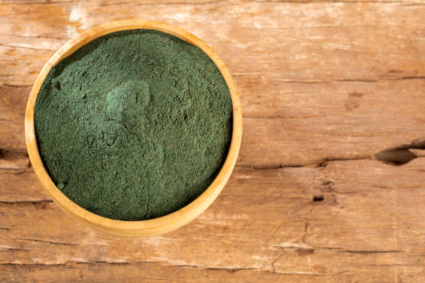 istock Spirulina powder dietary supplement - white background 1143027828
