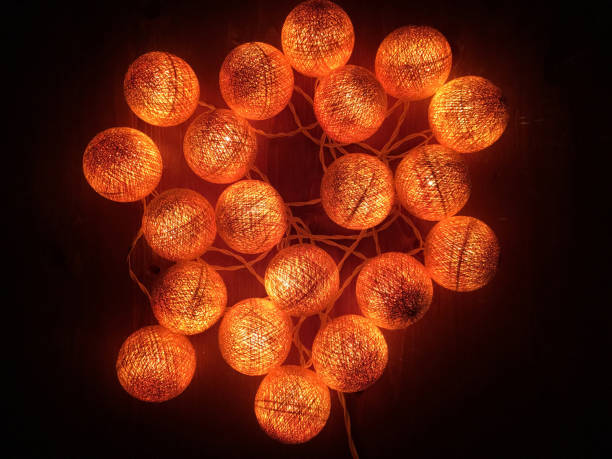 istock Cotton light fire balls garland. Bright multi-colored decoration. Creative decoration. 1143027848