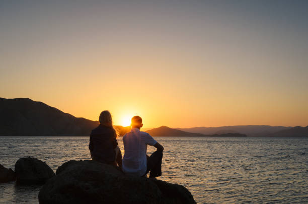 istock Summer holiday guy and girl 1143029424