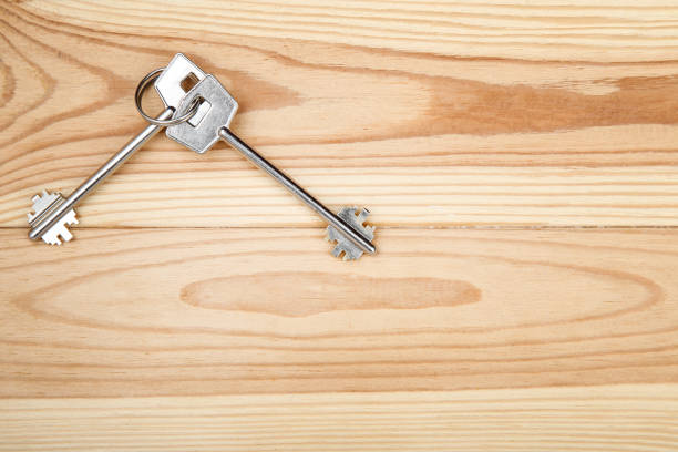 istock House keys on brown wooden table 1143029448