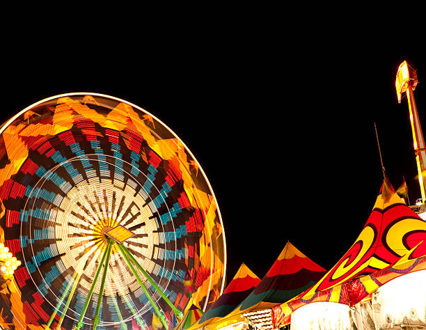 Ferris Wheel and Carnival Tents  midway fair stock pictures, royalty-free photos & images