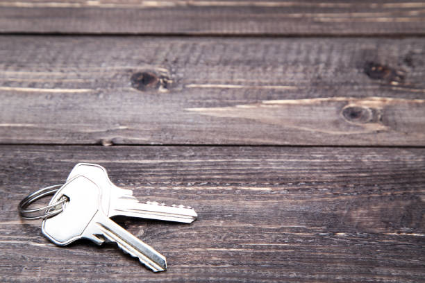 istock House keys on brown wooden table 1143030865
