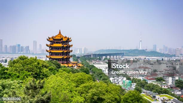 Scenic View Of The Yellow Crane Tower And Yangtze Great Bridge The Emblematic Landmark Of Wuhan Hubei China Stock Photo - Download Image Now