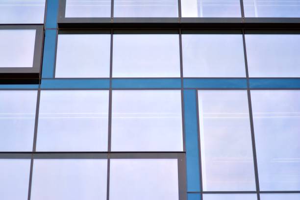istock Blue clean glass wall of modern office building 1143034904