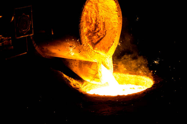 istock metal casting process with red high temperature fire in metal part factory 1143035367