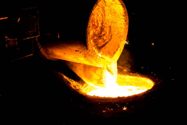 istock metal casting process with red high temperature fire in metal part factory 1143035369