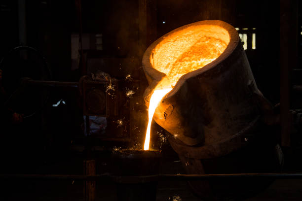 istock metal casting process with red high temperature fire in metal part factory 1143035372