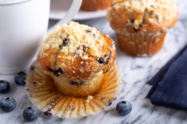istock Blueberry Muffins with Cup of Coffee 1143035373