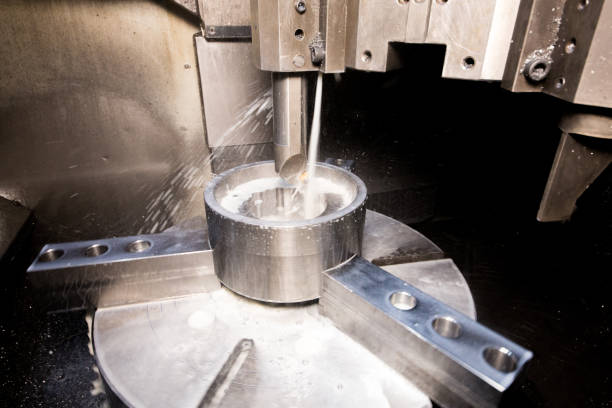 istock Close up of CNC machine at work 1143035406