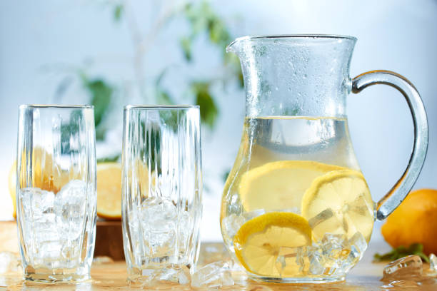 istock Infused water with cucumber, lemons and mint in a pitcher 1143036197