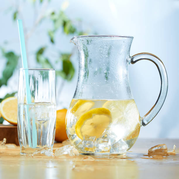 istock Infused water with cucumber, lemons and mint in a pitcher 1143036240