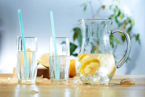 istock Infused water with cucumber, lemons and mint in a pitcher 1143036289