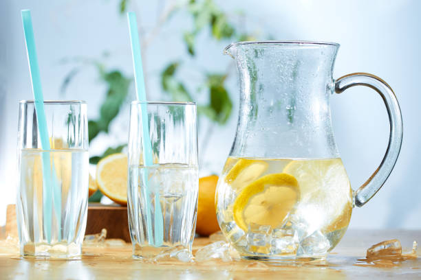 istock Infused water with cucumber, lemons and mint in a pitcher 1143037731