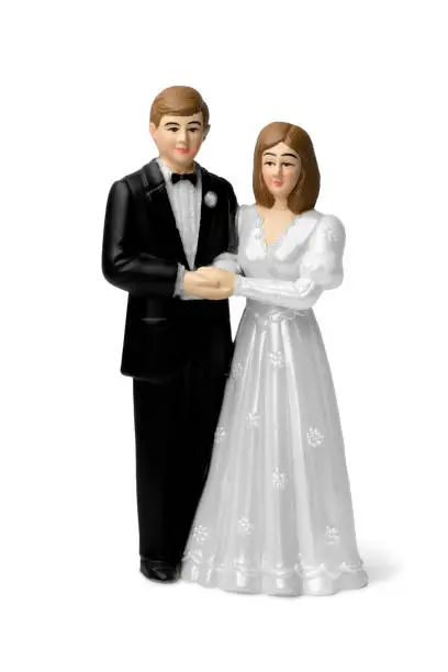 Bride and groom, classic cake topper isolated on white background