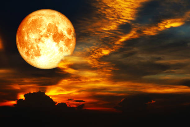 istock super blood moon on colorful cloud rainbow on night sky 1143041412