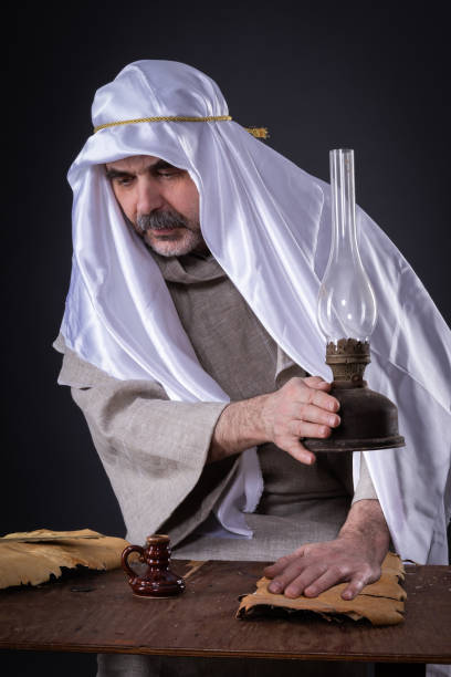 istock A man with paranormal abilities repels a levitating kerosene lamp 1143043517