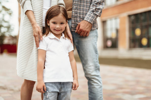 istock Happy kid spending leisure with parents 1143045639