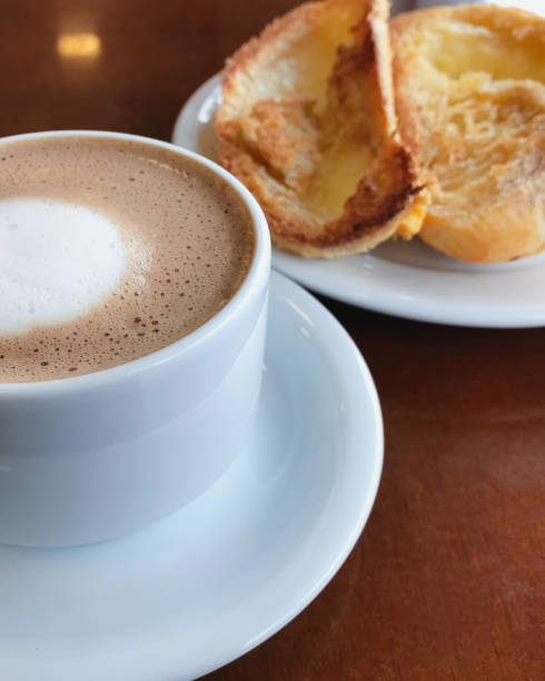 istock Brazilian breakfast. Bread toast with butter and coffee on a table. 1143046400