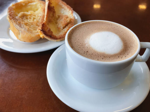 istock Brazilian breakfast. Bread toast with butter and coffee on a table. 1143046414