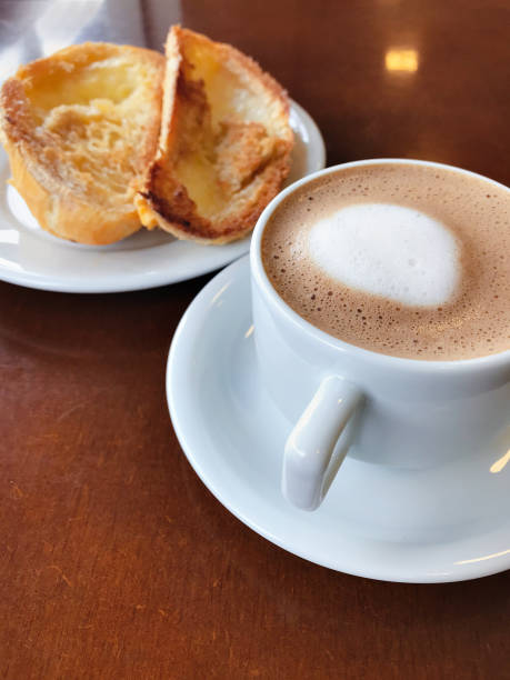 istock Brazilian breakfast. Bread toast with butter and coffee on a table. 1143046415