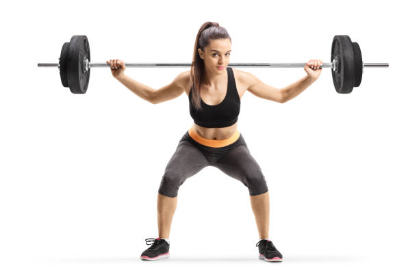 istock Young female athlete lifting weigths 1143048656