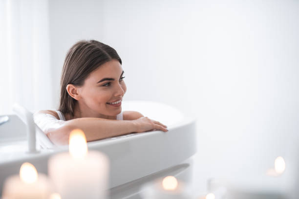 Outgoing female having leisure in foam water