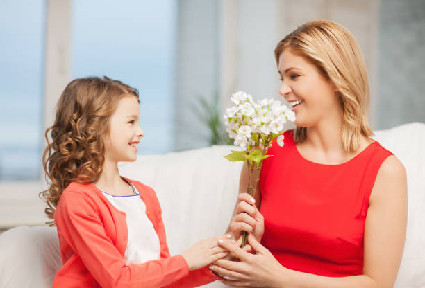 picture of mother and daughter with flowers