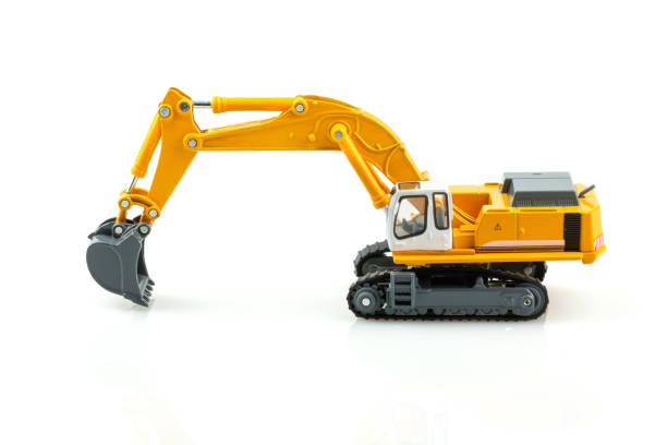 istock Yellow excavator model toy isolated on white background. 1143052628