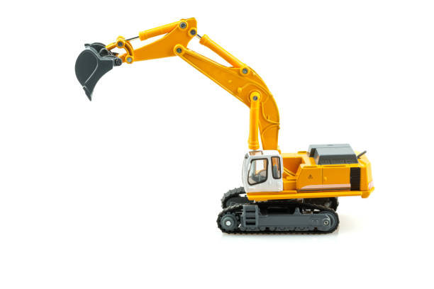 istock Yellow excavator model toy isolated on white background. 1143052659
