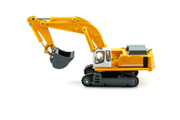 istock Yellow excavator model toy isolated on white background. 1143052682