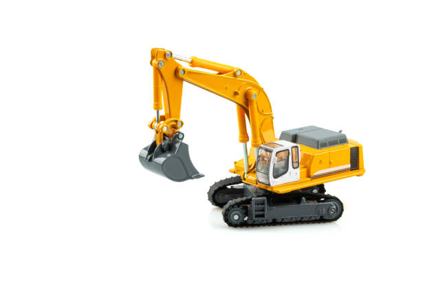 istock Yellow excavator model toy isolated on white background. 1143052700