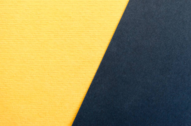 istock Black and yellow paper texture background. 1143054467