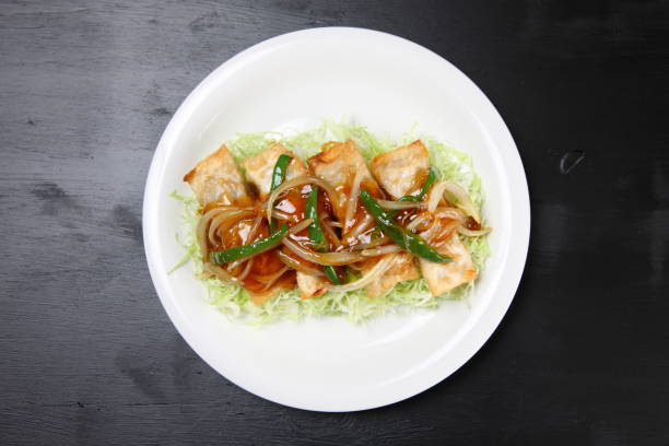istock Stick shaped dumplings with sweet and sour sauce 1143056402