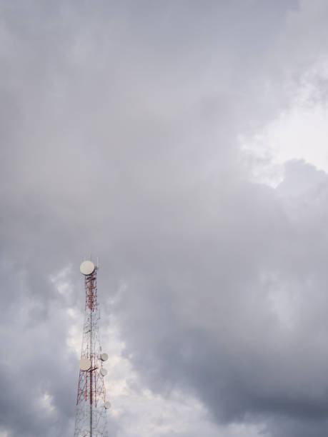 istock Telephone tower on the background of clouds 1143056508