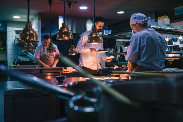 istock Teamwork in the kitchen of the high-end restaurant 1143057592