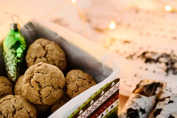 Danish Peppernuts (Pebernodder). Traditional Christmas danish cookies in a gift box. Cozy winter and Christmas setting, warm and homely. Danish hygge concept