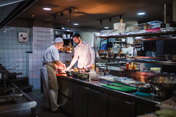 istock Teamwork in the kitchen of the high-end restaurant 1143058225