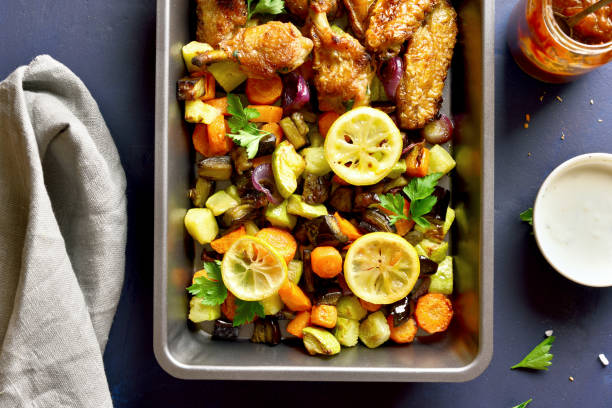 istock Grilled vegetables and chicken wings 1143059920