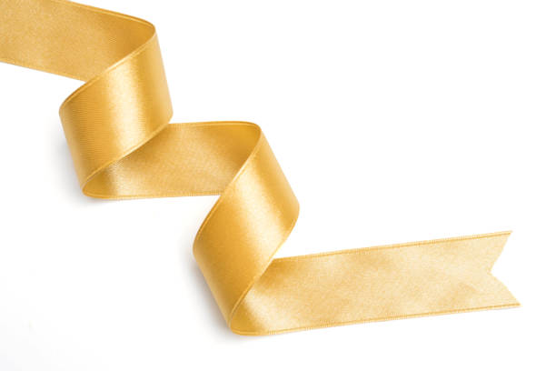 istock Gold ribbon in roll on white background 1143062408