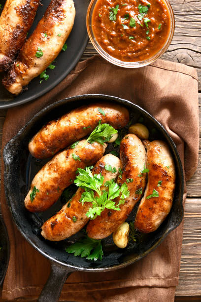 istock Roasted sausages in frying pan 1143063906