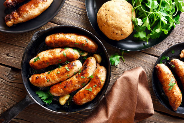 istock Roasted sausages in frying pan 1143063927