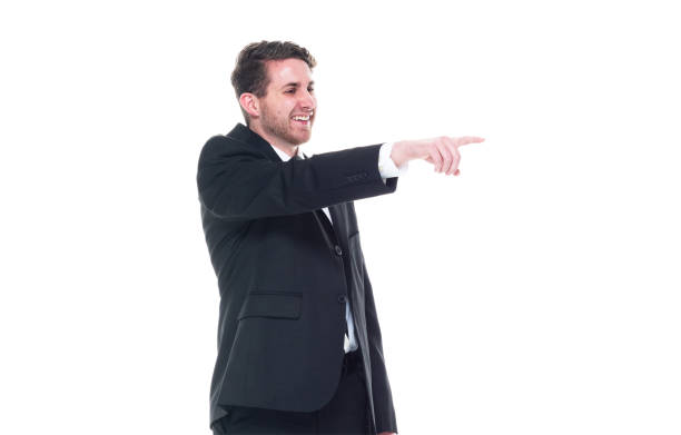 istock Young handsome businessman wearing a suit and tie - pointing 1143067545