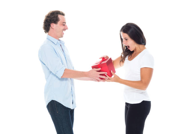 istock Husband giving a gift to his wife 1143068057