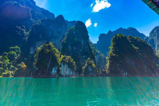 Khao Sok Lake National Park Khao Sok Lake National Park in Thailand. The lake is man made with a Dam and one end. The flooding of the valley has created an abundance of steep sided limestone islands. kao sok national park stock pictures, royalty-free photos & images