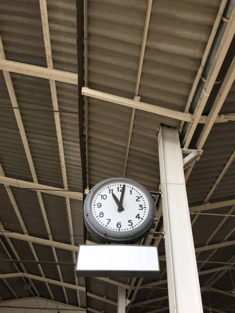 istock Hanging clock at railway station 1143075693