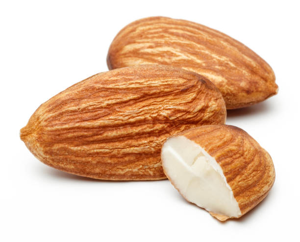 istock Group of almonds isolated on white 1143077915