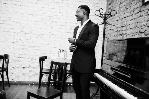istock Strong powerful african american man in black suit 1143078016
