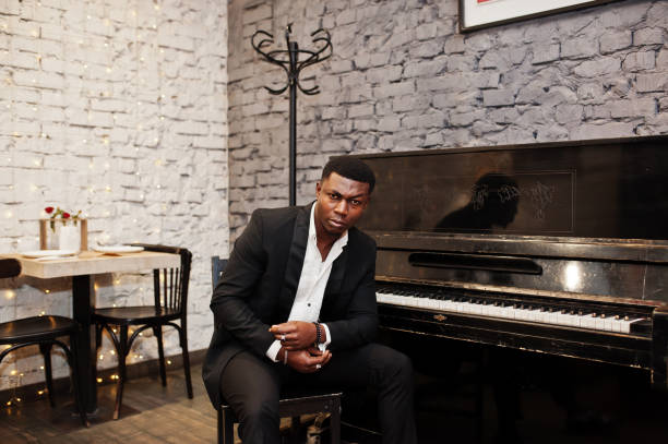 istock Strong powerful african american man in black suit 1143078030