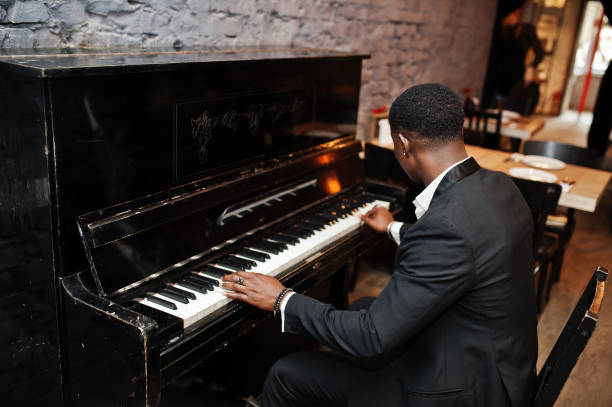 istock Strong powerful african american man in black suit 1143078105