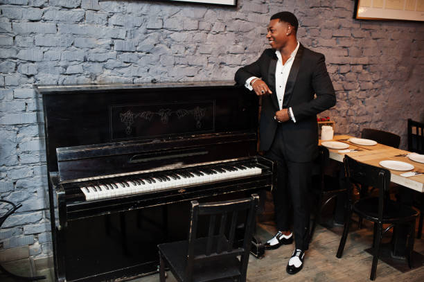 istock Strong powerful african american man in black suit 1143078144